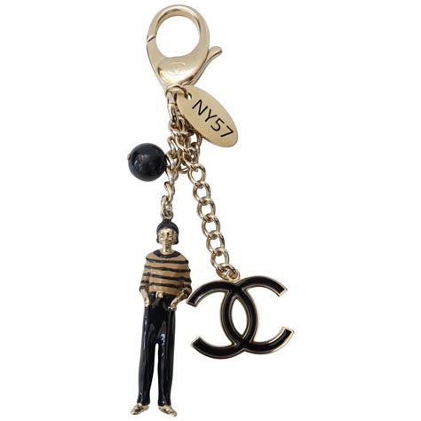 key holder chanel|Chanel fluffy keychain.